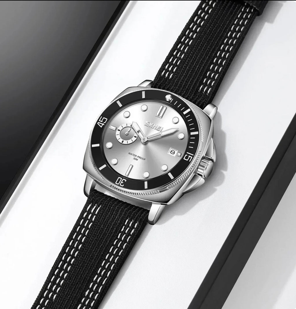 SKMEI 9328 Men's Casual Analog Quartz Watch – Silver Dial with Black Nylon Strap