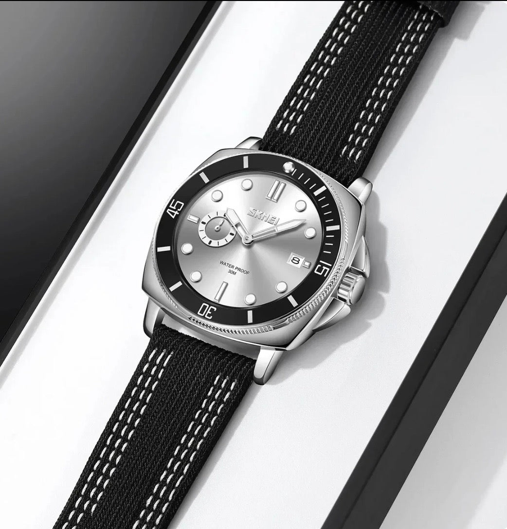SKMEI 9328 Men's Casual Analog Quartz Watch – Silver Dial with Black Nylon Strap